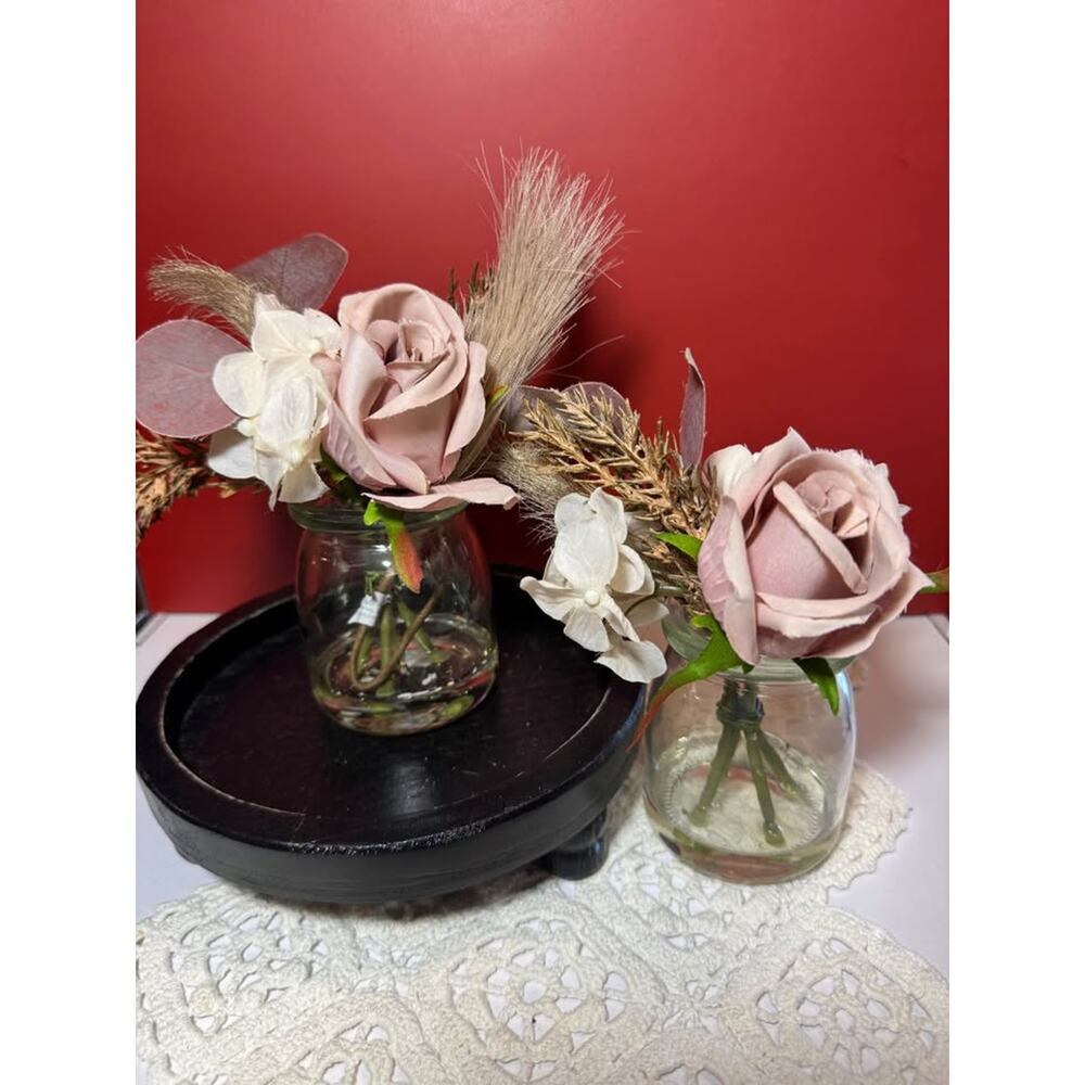 2 cute faux flower arrangements in glass vases